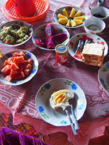 Papaya, Dragon Fruit, Avocado salad and eggs for breakfast